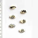 Incomparable Buttons - Black & White Small Oval L279 - Card of 5