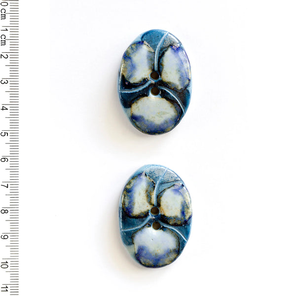 Incomparable Buttons - Large Blue Oval L512 - Card of 2