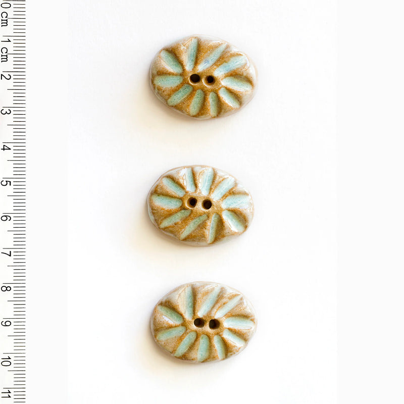 Incomparable Buttons - Medium Aqua Oval L584 - Card of 3